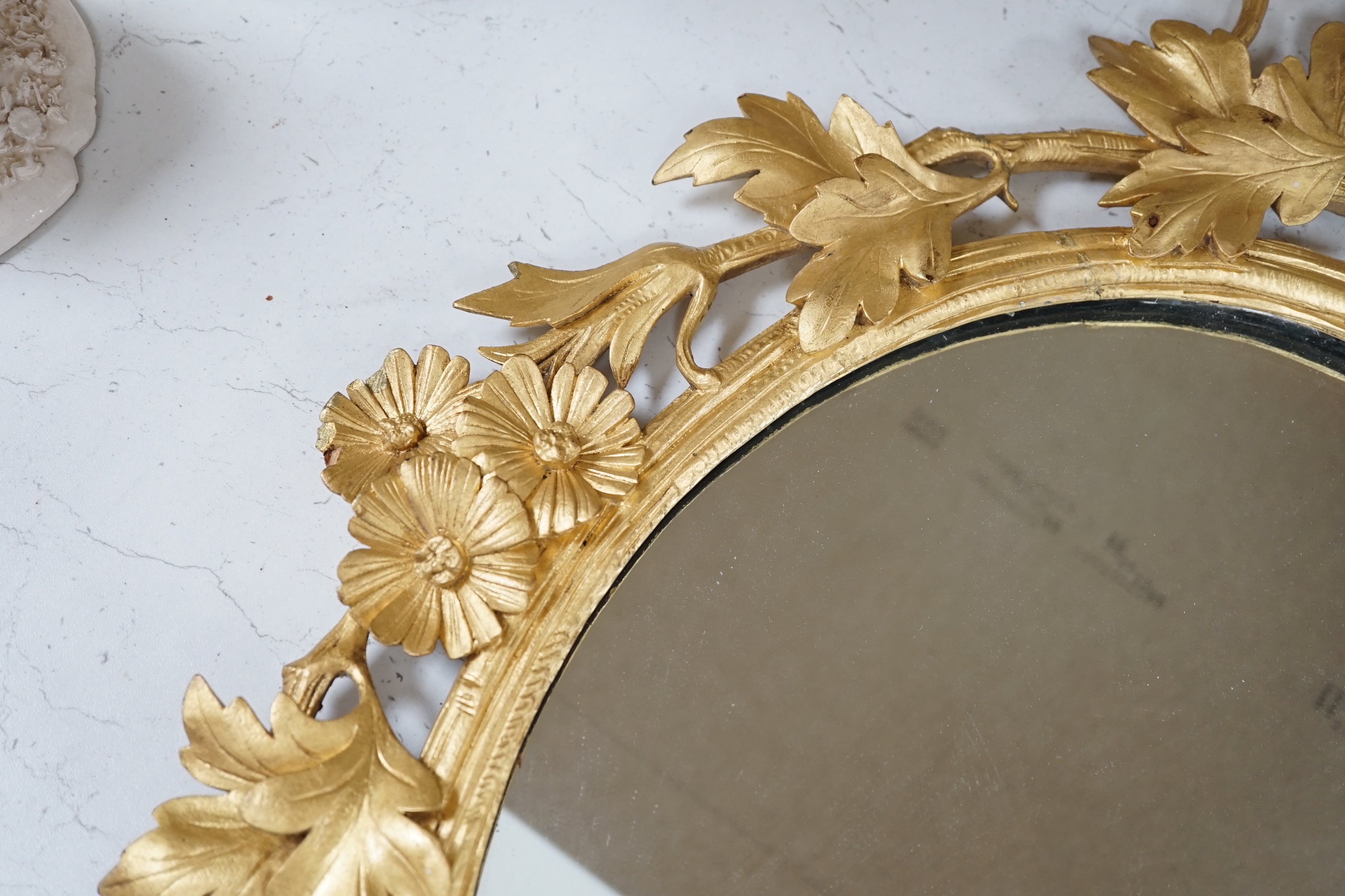 A Victorian carved gilt wood framed wall mirror, 66x50cm